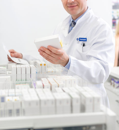 Pharmacist preparing medications